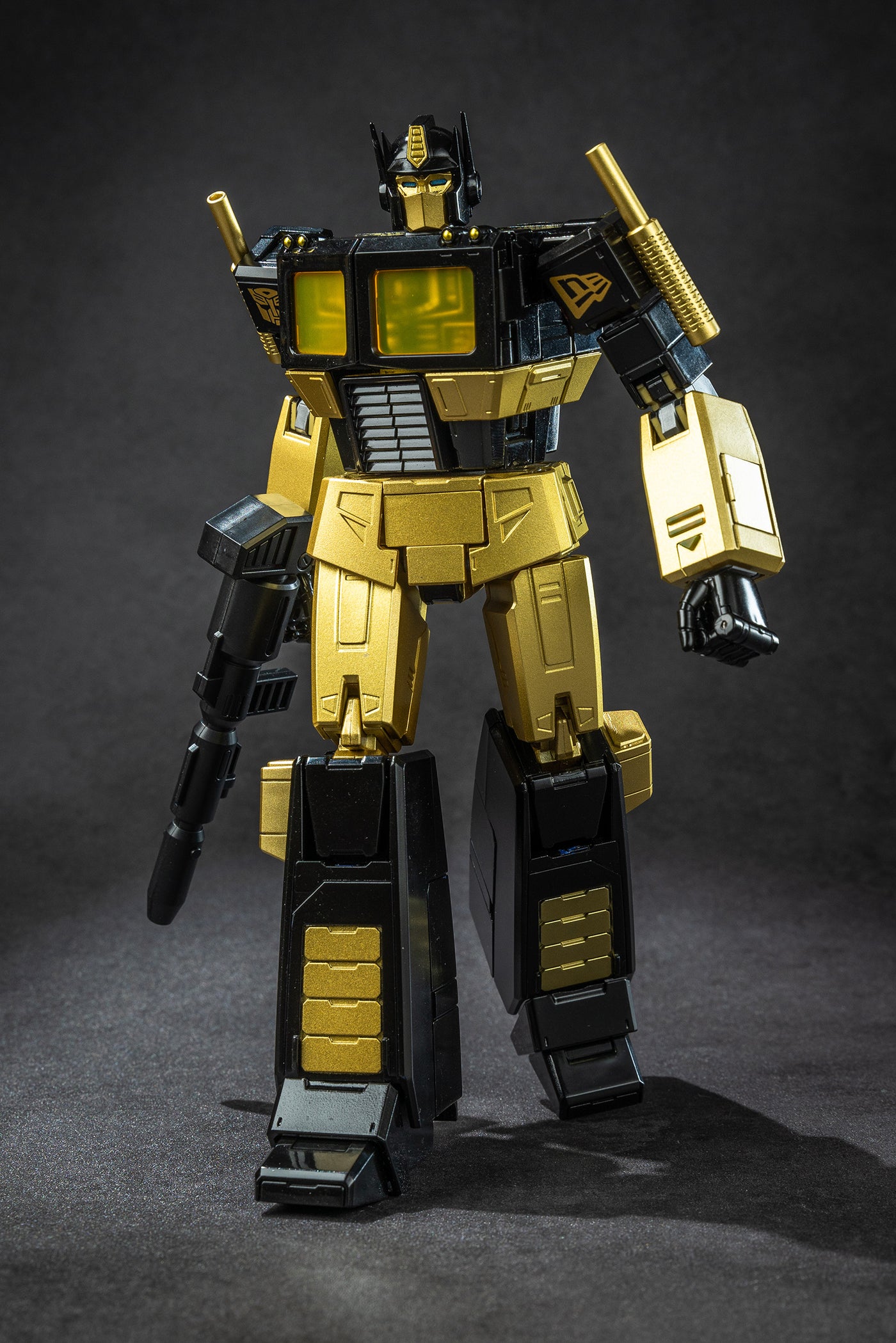 NEW ERA X TRANSFORMERS GENERATION ONE OPTIMUS PRIME BLACK AND GOLD FIGURE