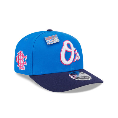 NEW ERA X BIG LEAGUE CHEW BALTIMORE ORIOLES NAVY VISOR MED BLUE 9SEVENTY STRETCH SNAP CAP