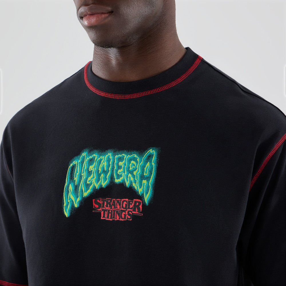 NEW ERA X NETFLIX STRANGER THINGS GRAPHIC BLACK OVERSIZED SHORT SLEEVE T-SHIRT